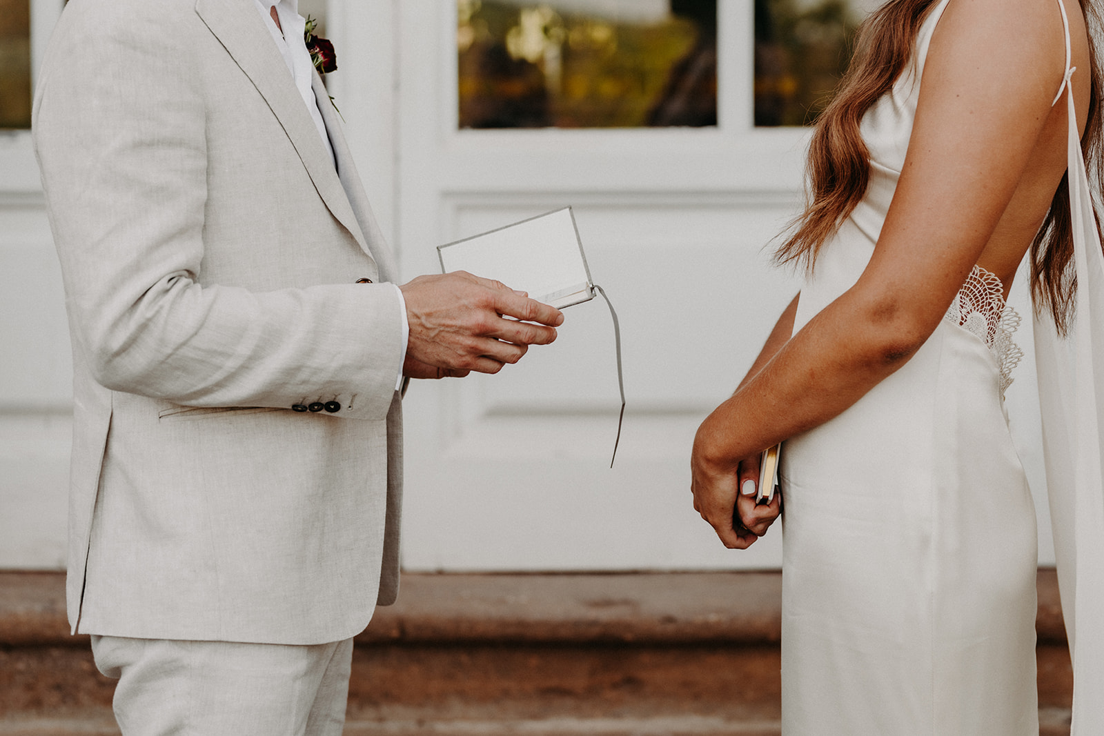 Bride and groom exchanging vows during an intimate Italian wedding ceremony